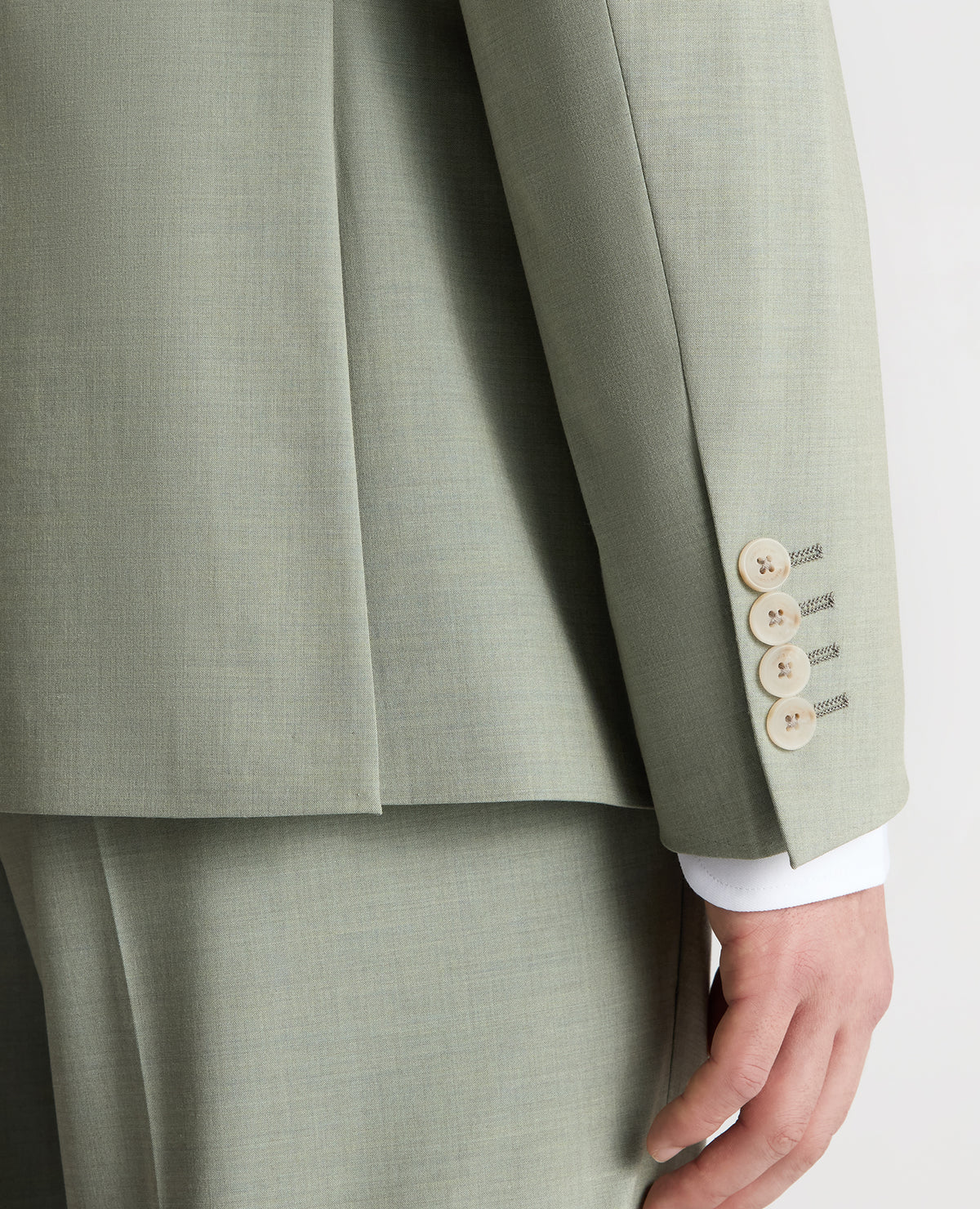 Man wearing a green Slim Fit Stretch Suit Jacket
