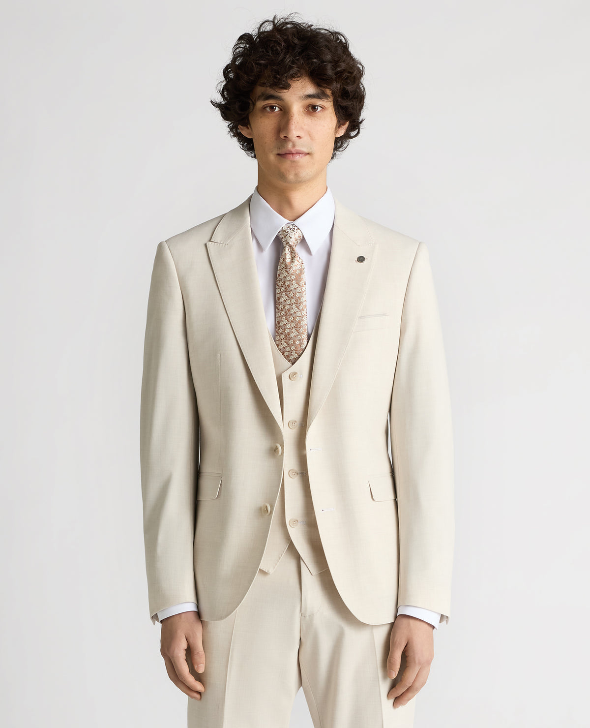 Man wearing a sand Slim Fit Stretch Suit