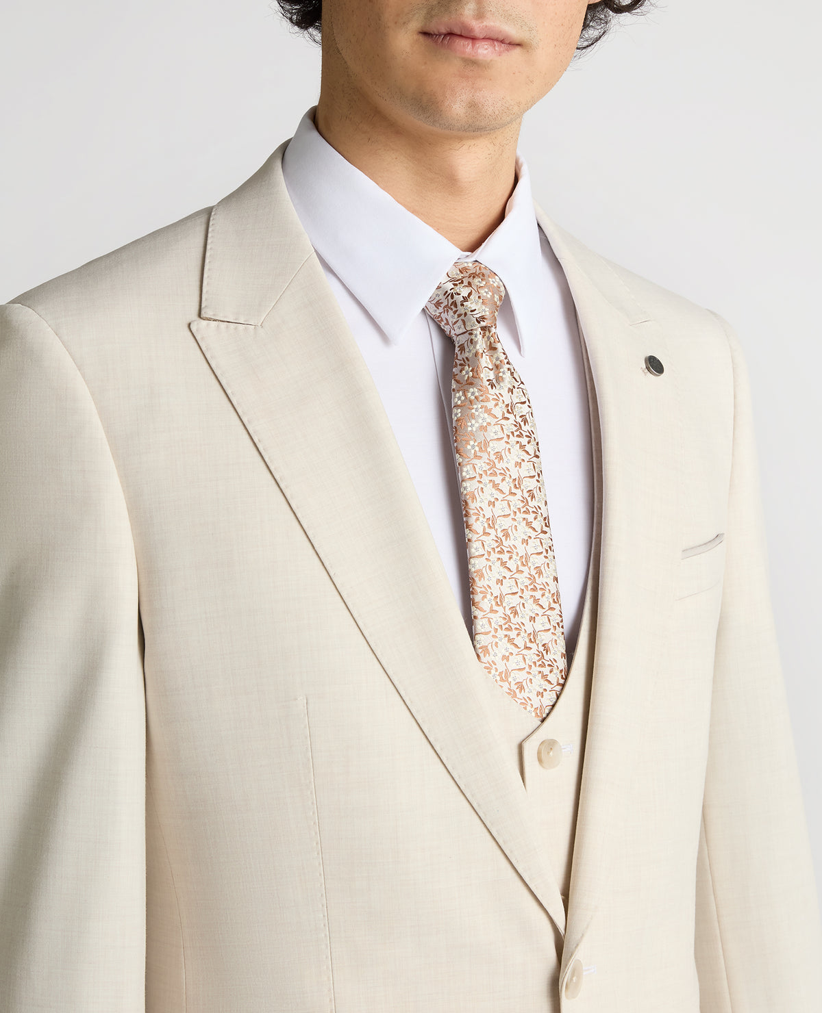 Man wearing a sand Slim Fit Stretch Suit