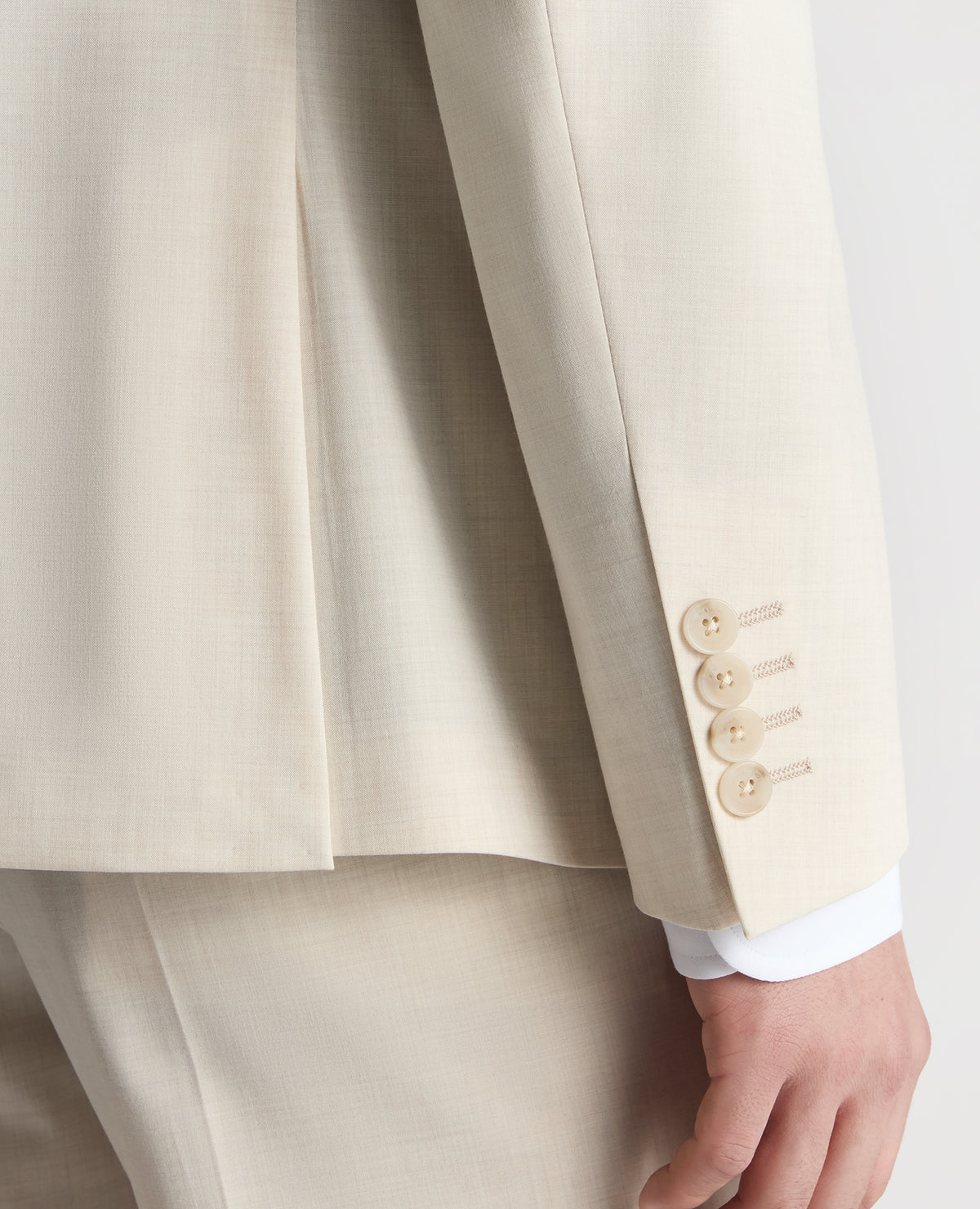 Man wearing a sand Slim Fit Stretch Suit