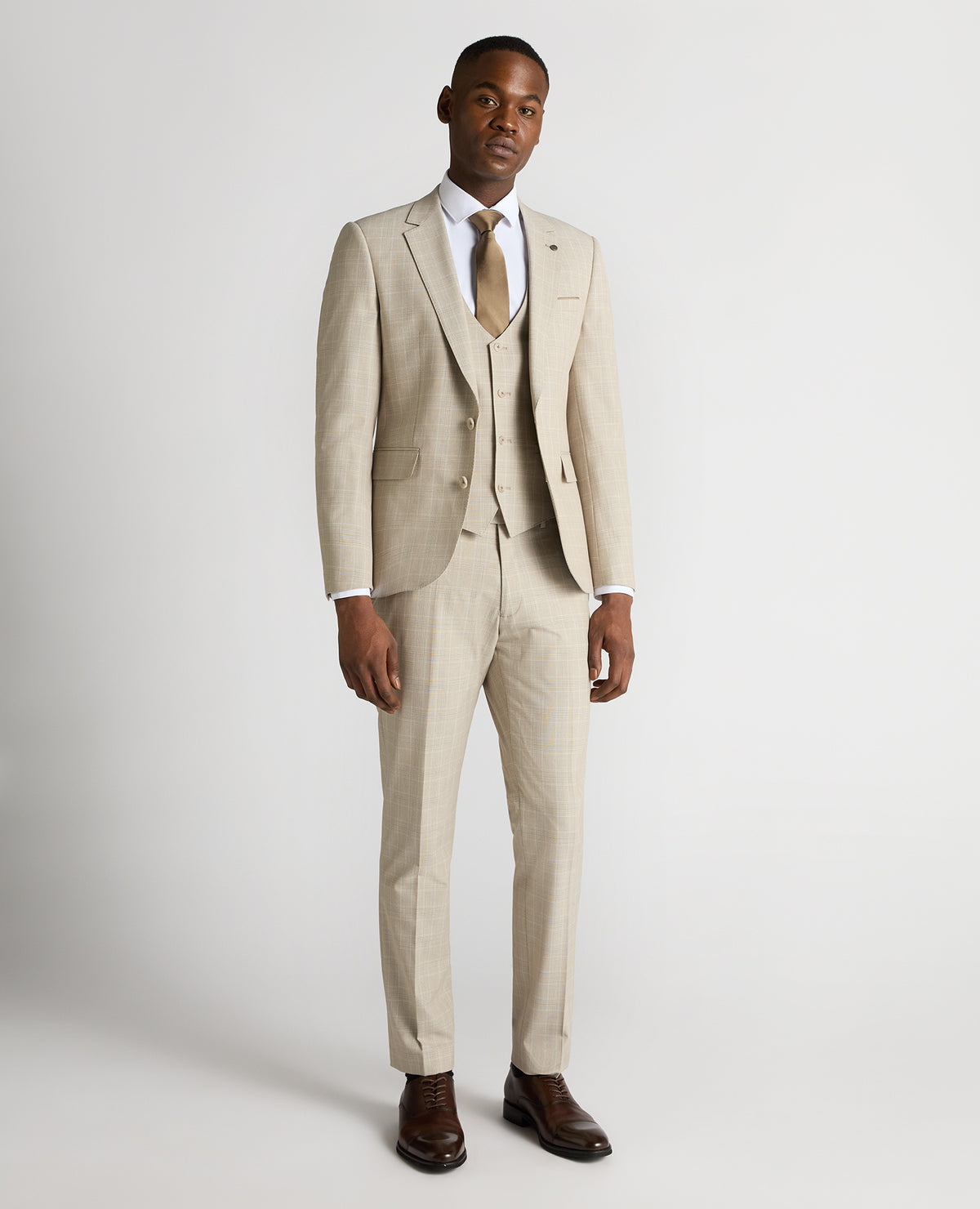 Man wearing a sand Slim Fit Checked Stretch Suit