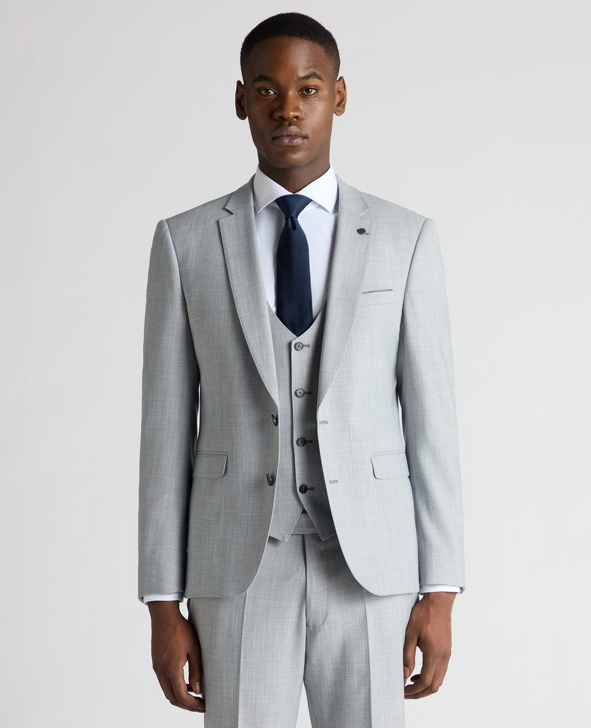 Man wearing a blue Slim Fit Micro Houndstooth Suit Jacket