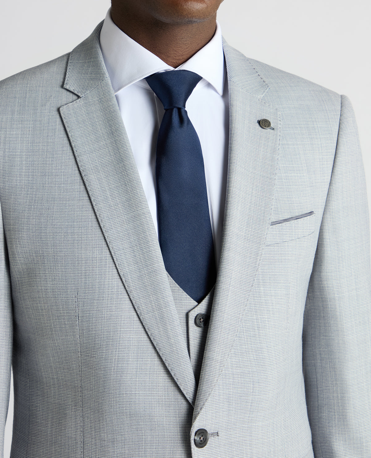 Man wearing a blue Slim Fit Micro Houndstooth Suit Jacket