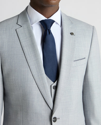 Man wearing a blue Slim Fit Micro Houndstooth Suit Jacket