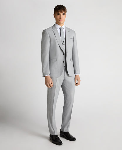 Man wearing a blue Tapered Fit Micro Houndstooth Suit Jacket