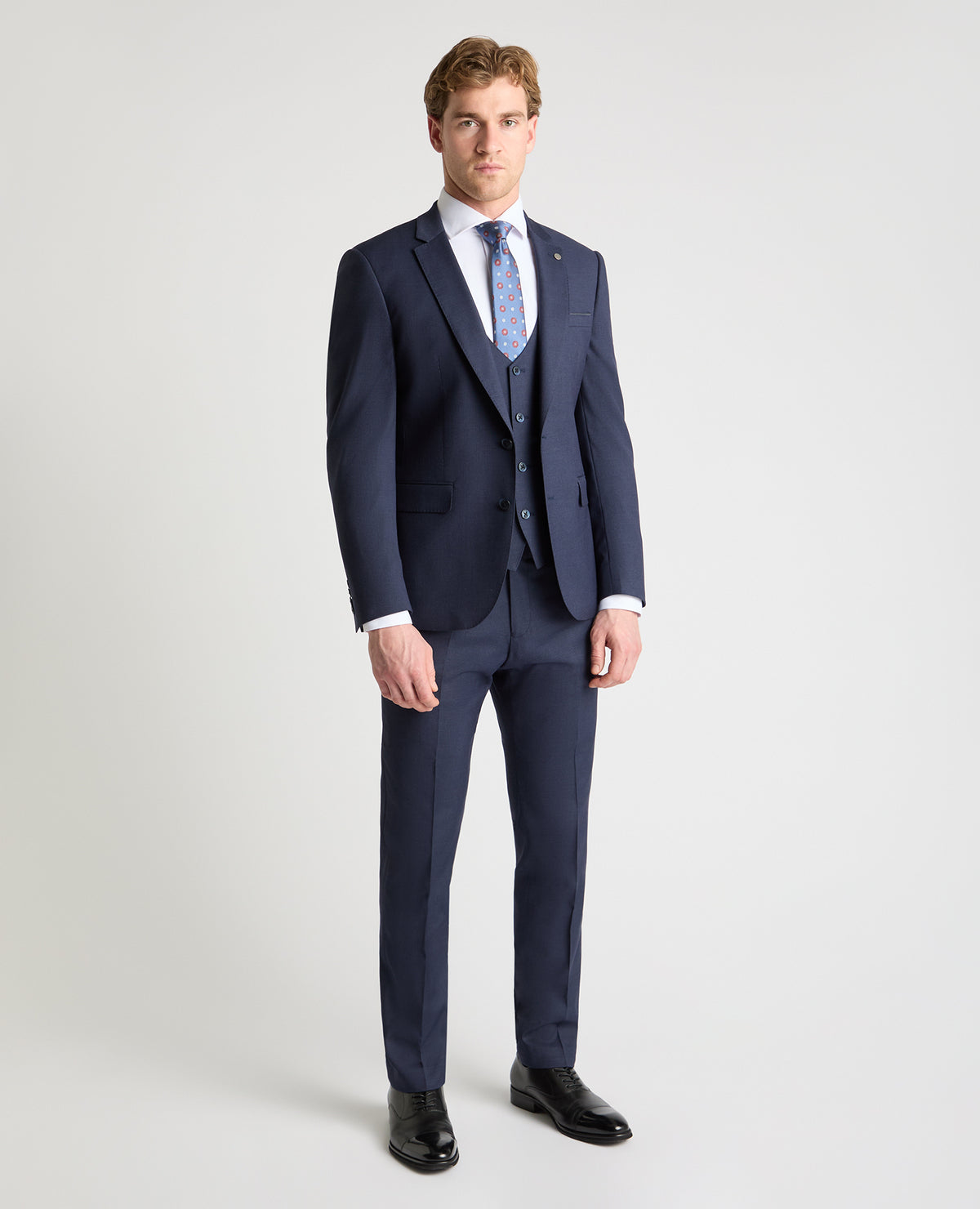 Man wearing a navy jacket