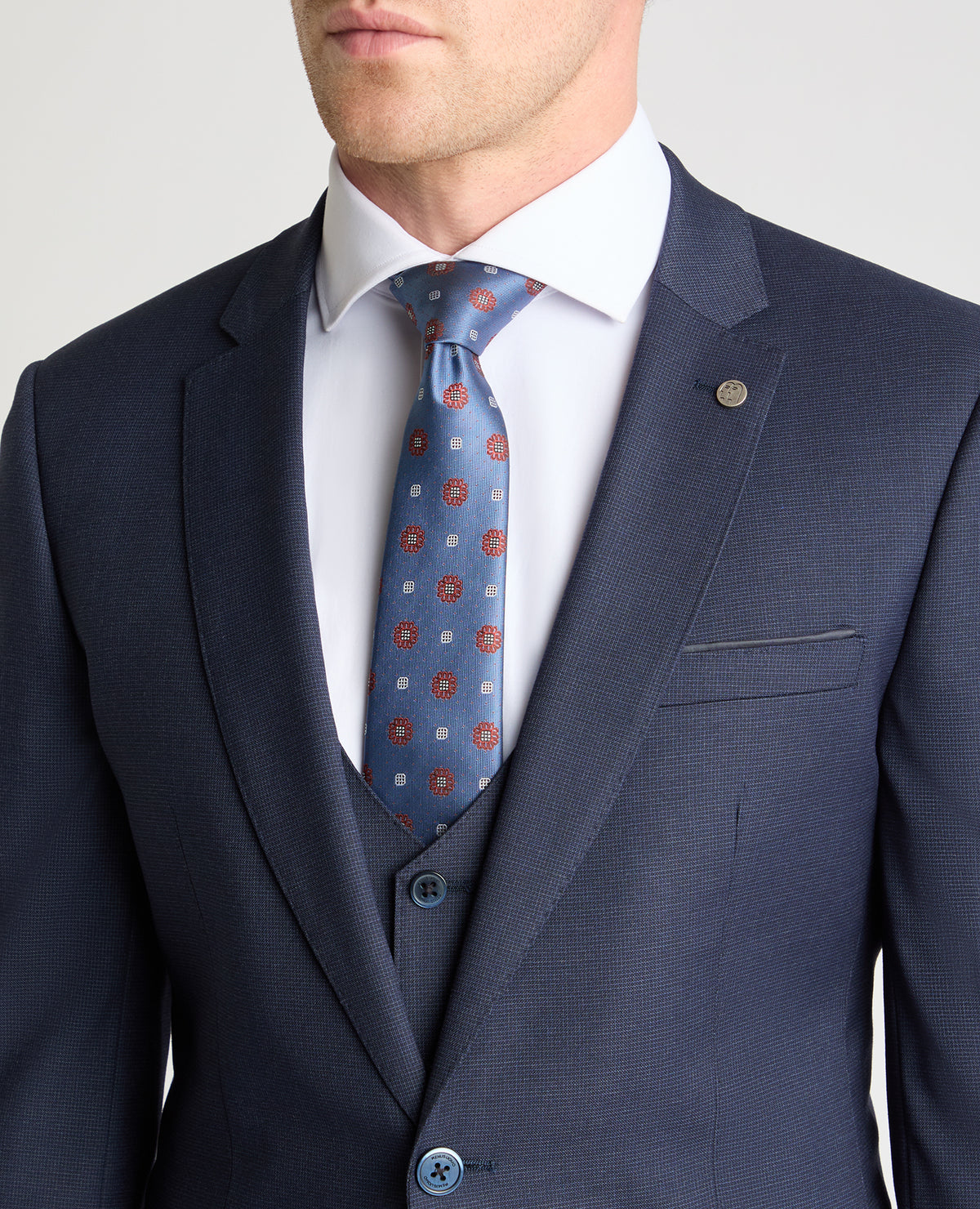 Man wearing a navy jacket