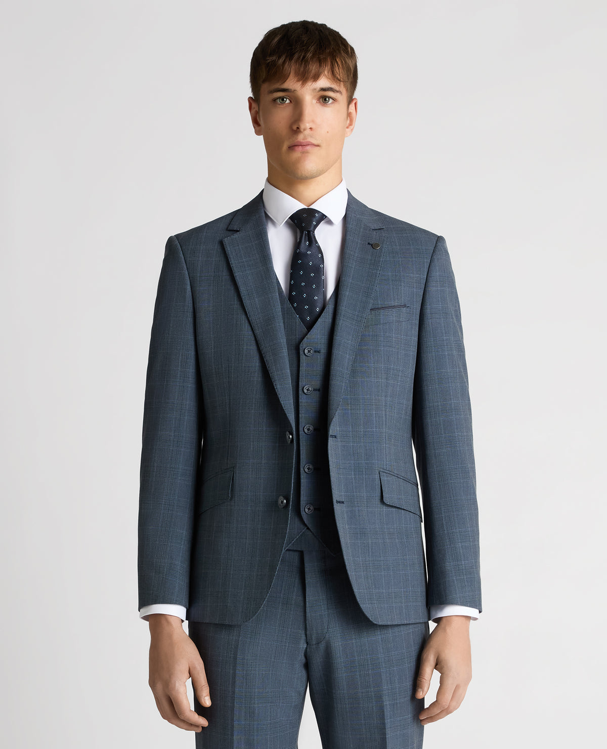 Man wearing a blue Tapered Fit Checked Stretch Suit Jacket