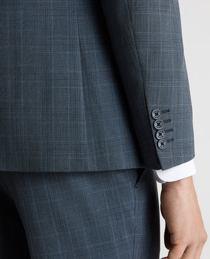 Man wearing a blue Tapered Fit Checked Stretch Suit Jacket