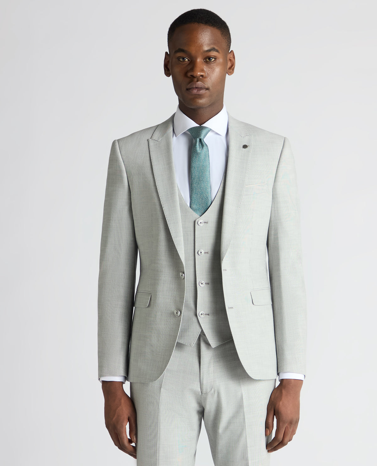 Man wearing a grey Slim Fit Stretch Micro Pinstripe Suit Jacket