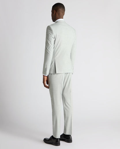 Man wearing a grey Slim Fit Stretch Micro Pinstripe Suit Jacket