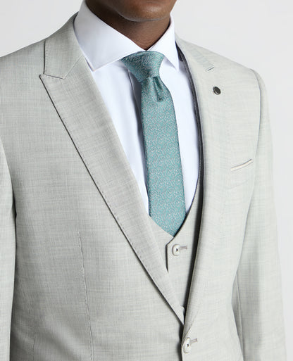 Man wearing a grey Slim Fit Stretch Micro Pinstripe Suit Jacket
