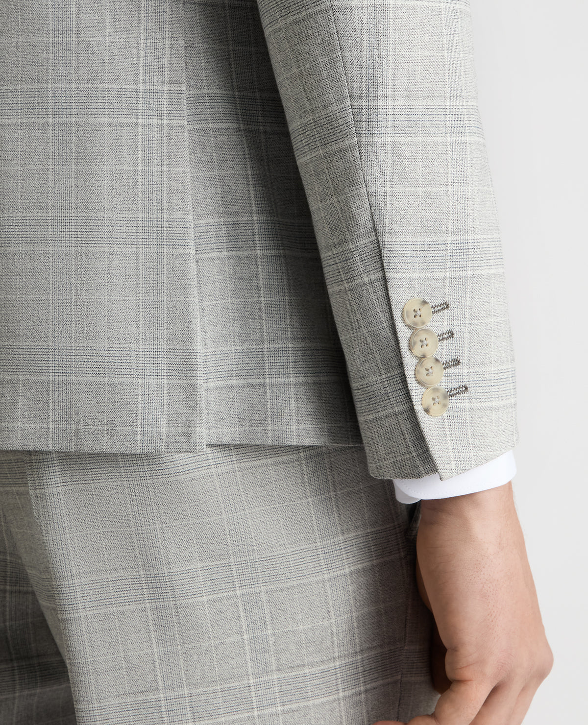 Man wearing a grey Slim Fit Checked Stretch Suit Jacket