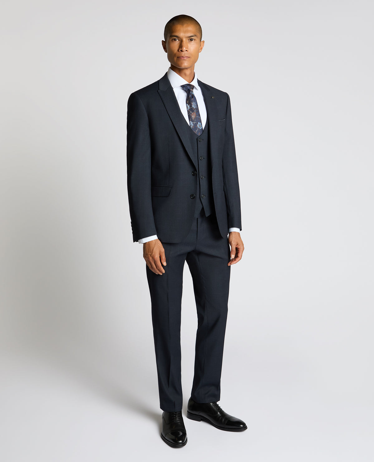 Man wearing a navy Slim Fit Stretch Printed Jacket