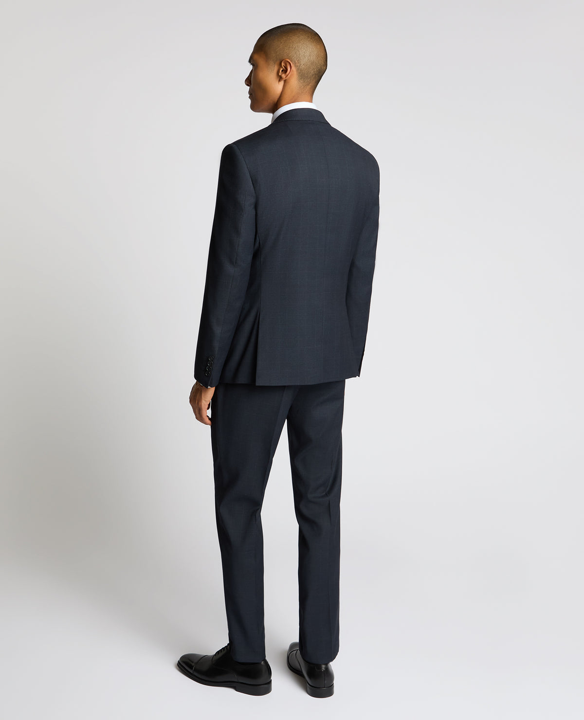 Man wearing a navy Slim Fit Stretch Printed Jacket
