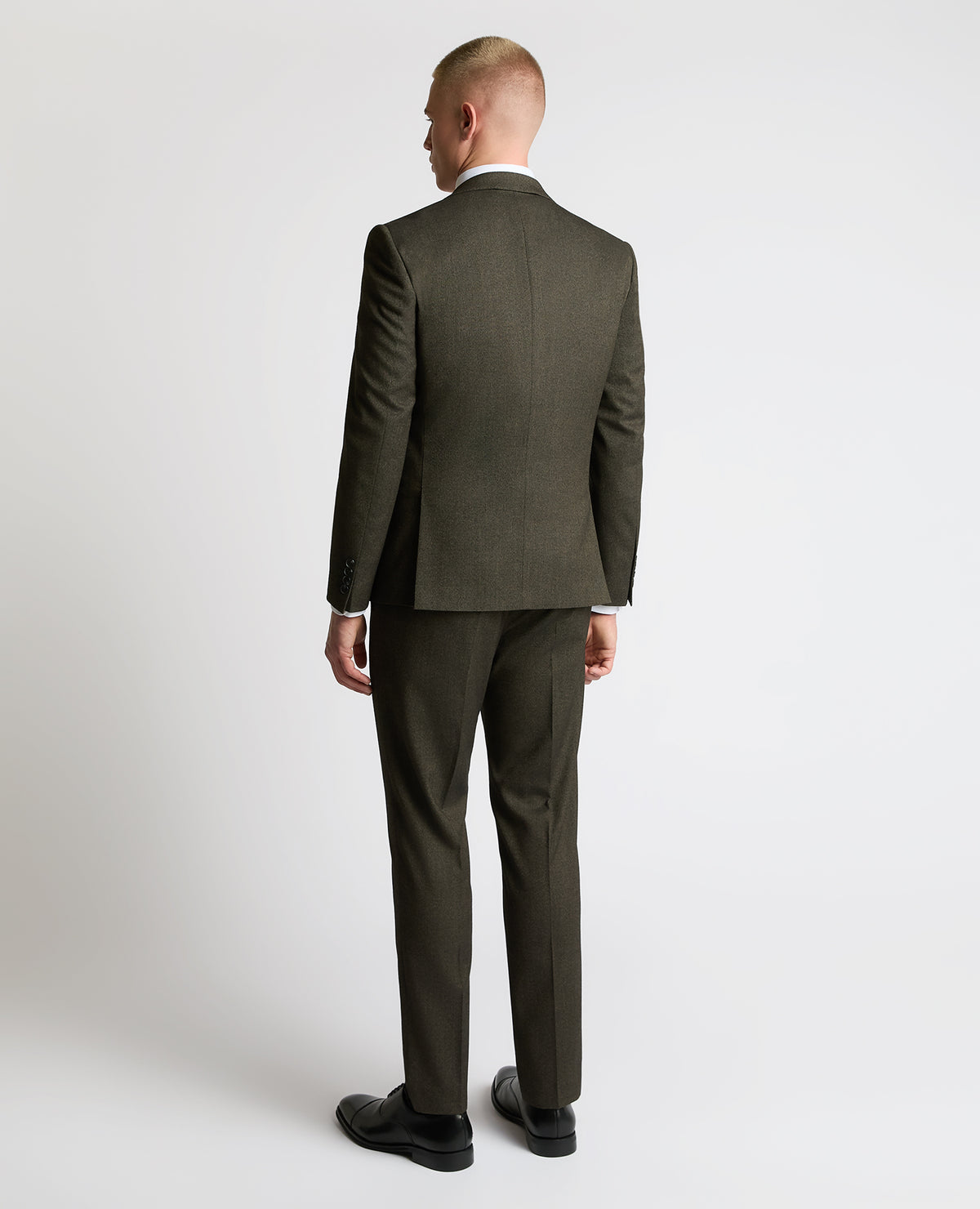 Man wearing a brown Slim fit Stretch Suit Jacket