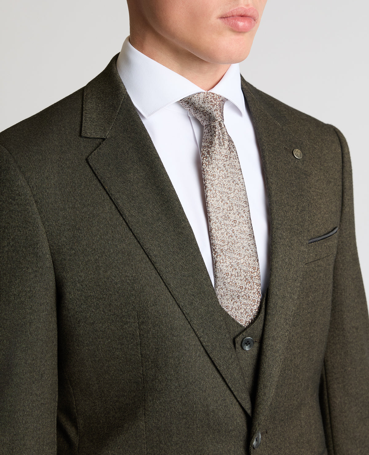 Man wearing a brown Slim fit Stretch Suit Jacket