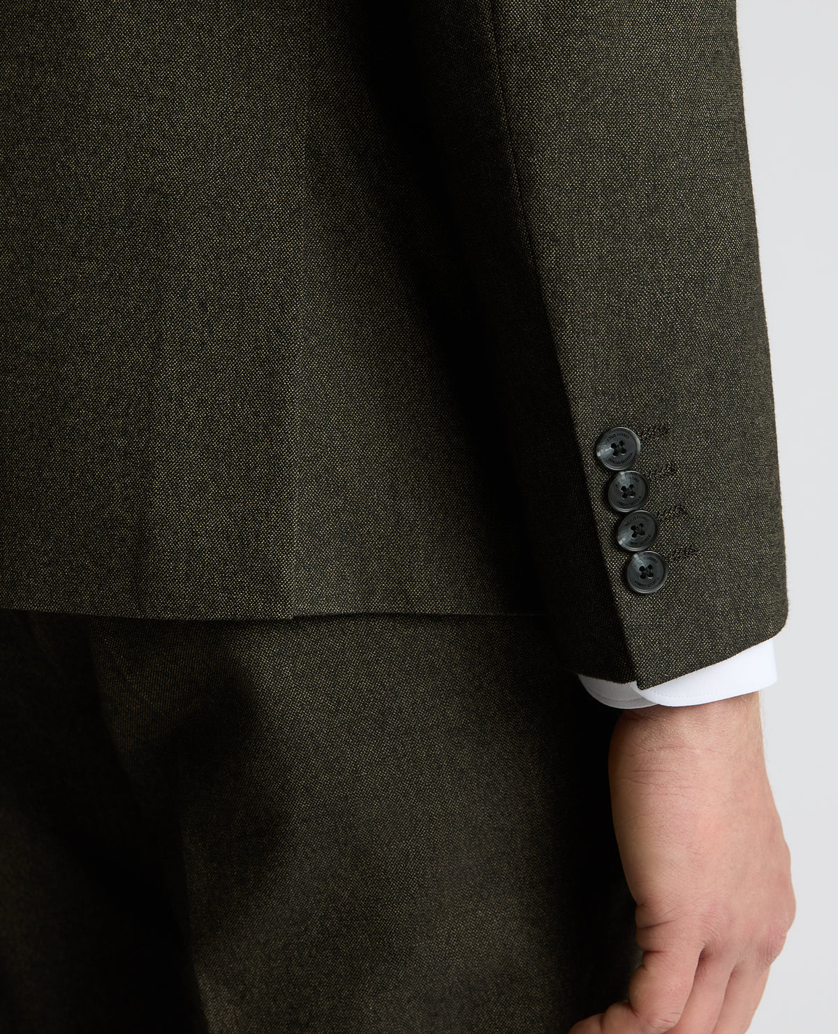 Man wearing a brown Slim fit Stretch Suit Jacket