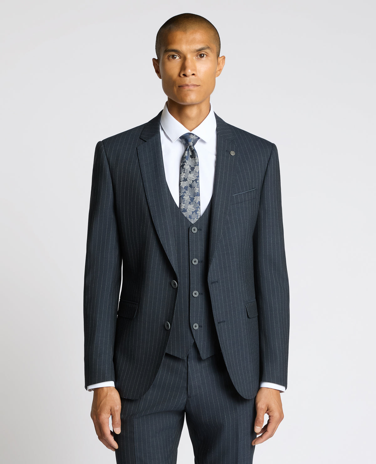 Man wearing a navy Slim Fit Stripe Stretch Jacket