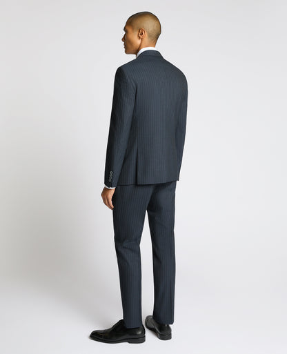 Man wearing a navy Slim Fit Stripe Stretch Jacket