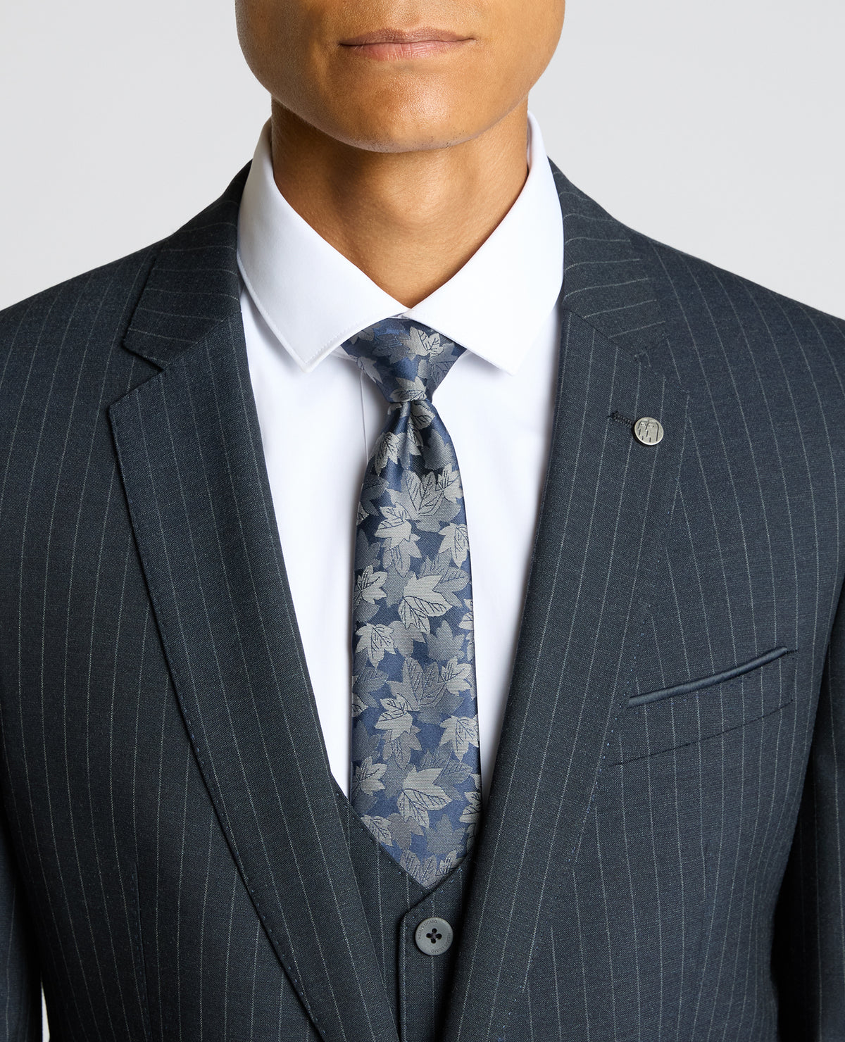 Man wearing a navy Slim Fit Stripe Stretch Jacket