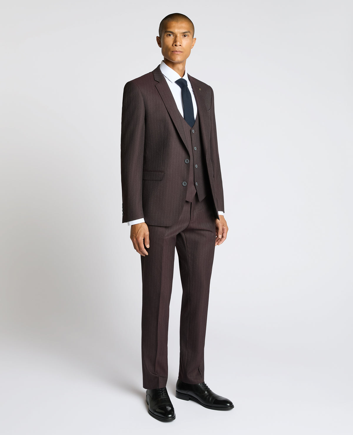 Man wearing a red Slim Fit Stripe Stretch Jacket
