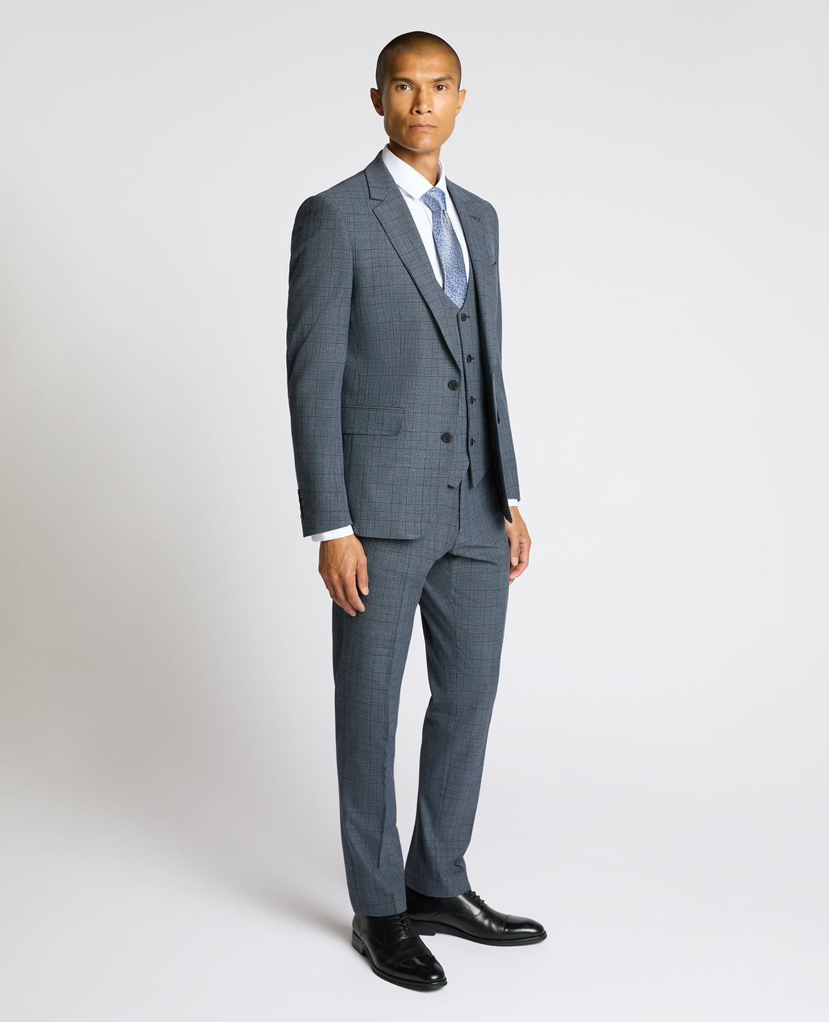 Man wearing a blue Slim Fit Check Jacket