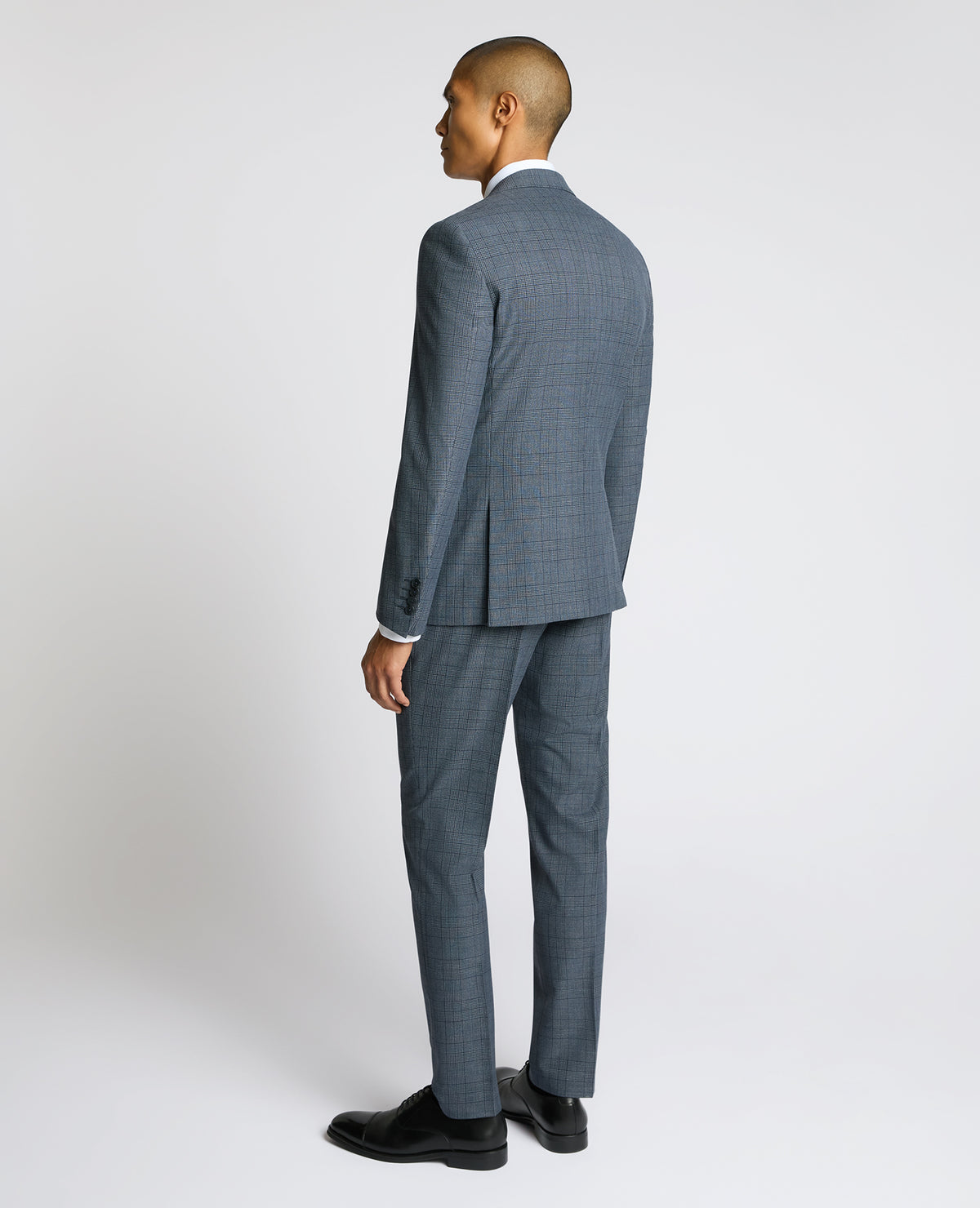 Man wearing a blue Slim Fit Check Jacket