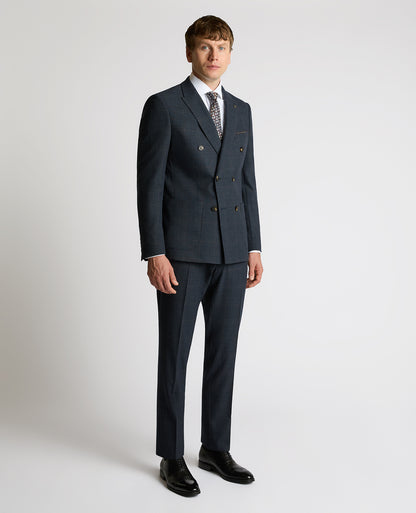 Man wearing a navy Slim Fit Double-Breasted Stretch Jacket