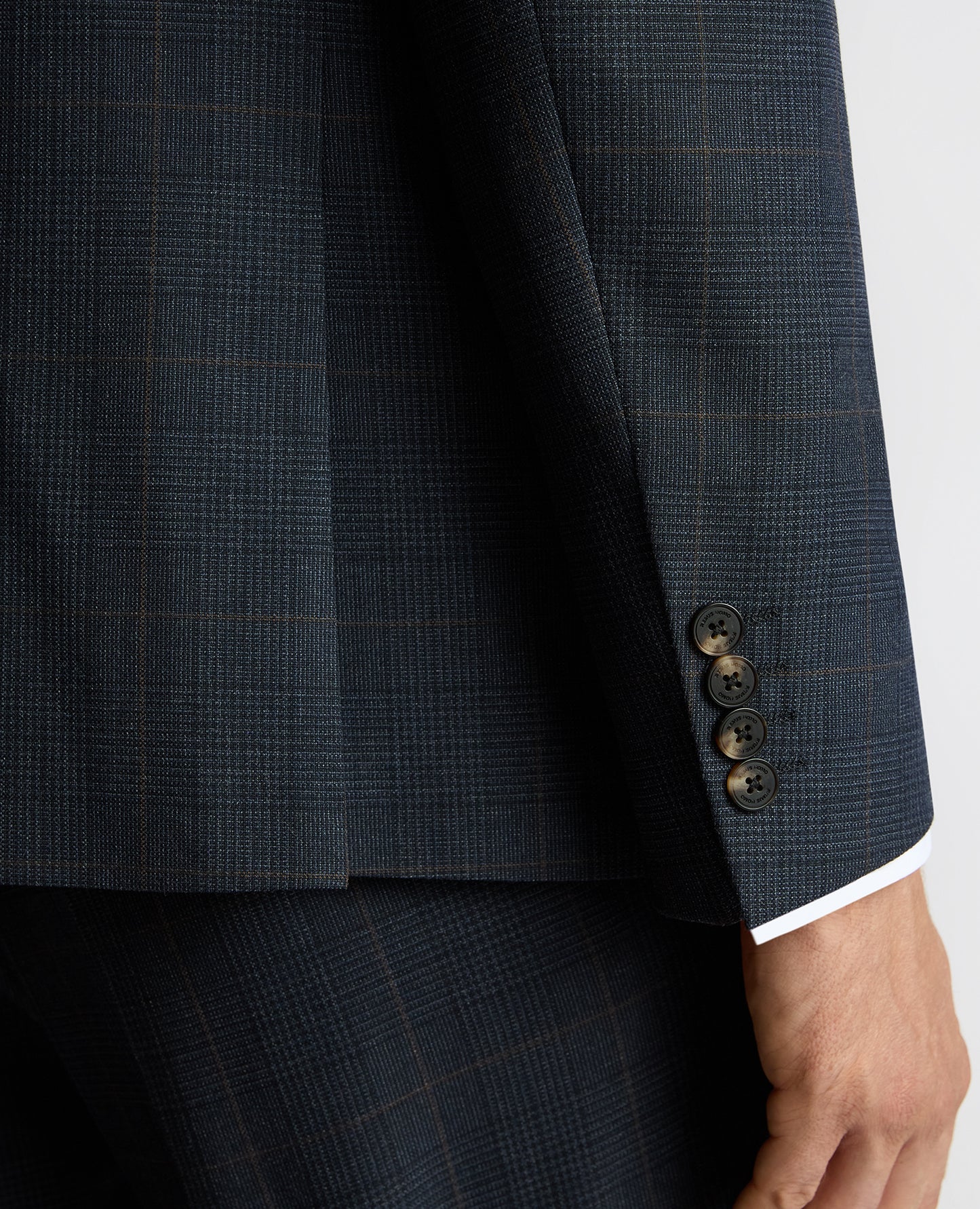 Man wearing a navy Slim Fit Double-Breasted Stretch Jacket