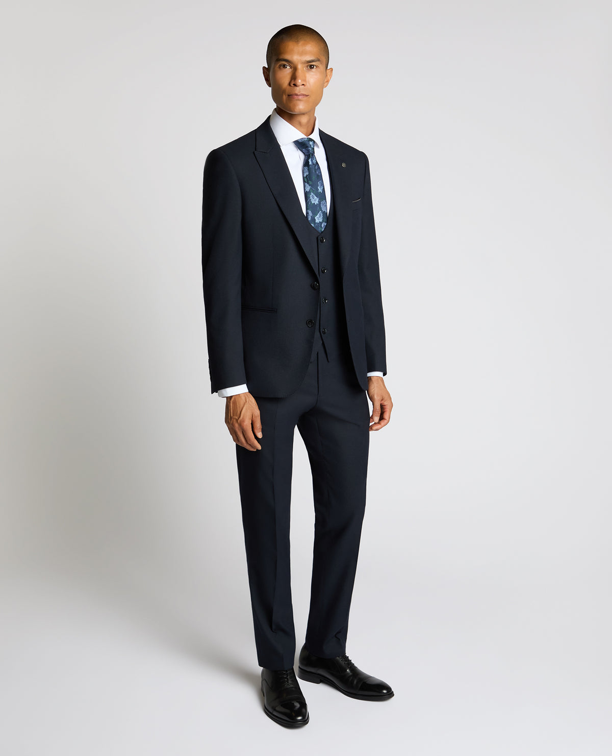 Man wearing a navy Slim Fit Stretch Jacket