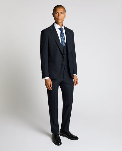 Man wearing a navy Slim Fit Stretch Jacket