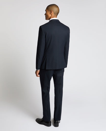 Man wearing a navy Slim Fit Stretch Jacket
