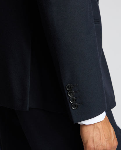 Man wearing a navy Slim Fit Stretch Jacket