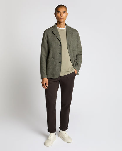 Man wearing a green Slim Fit De-Constructed Dego Jacket