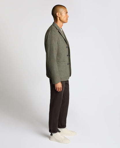 Man wearing a green Slim Fit De-Constructed Dego Jacket