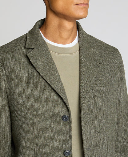 Man wearing a green Slim Fit De-Constructed Dego Jacket