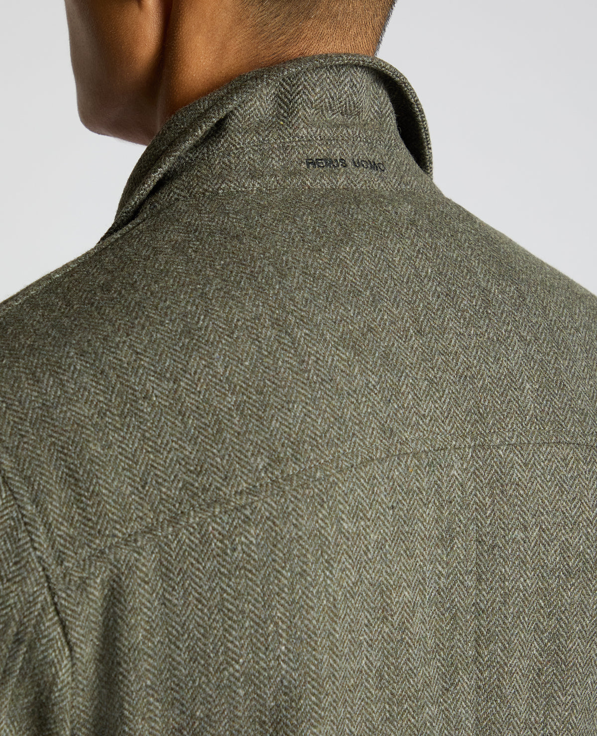 Man wearing a green Slim Fit De-Constructed Dego Jacket