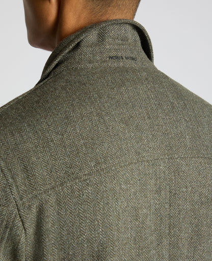 Man wearing a green Slim Fit De-Constructed Dego Jacket