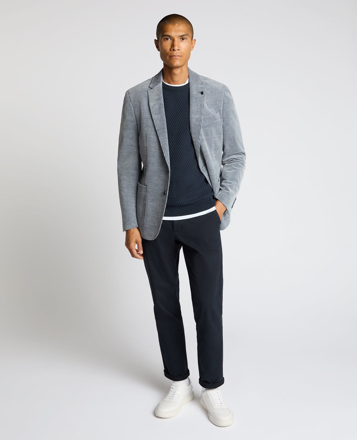Man wearing a blue Slim Fit Cotton Stretch Alba Jacket