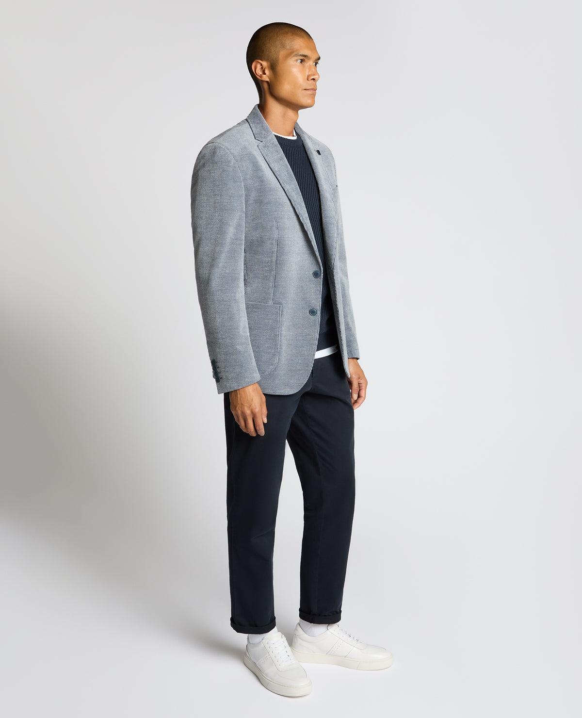 Man wearing a blue Slim Fit Cotton Stretch Alba Jacket