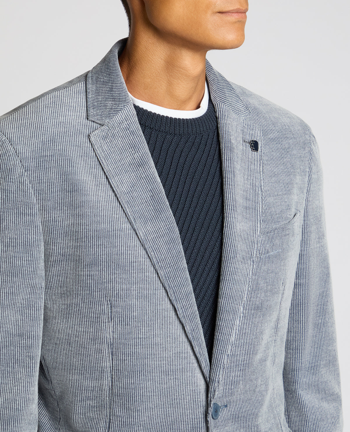 Man wearing a blue Slim Fit Cotton Stretch Alba Jacket