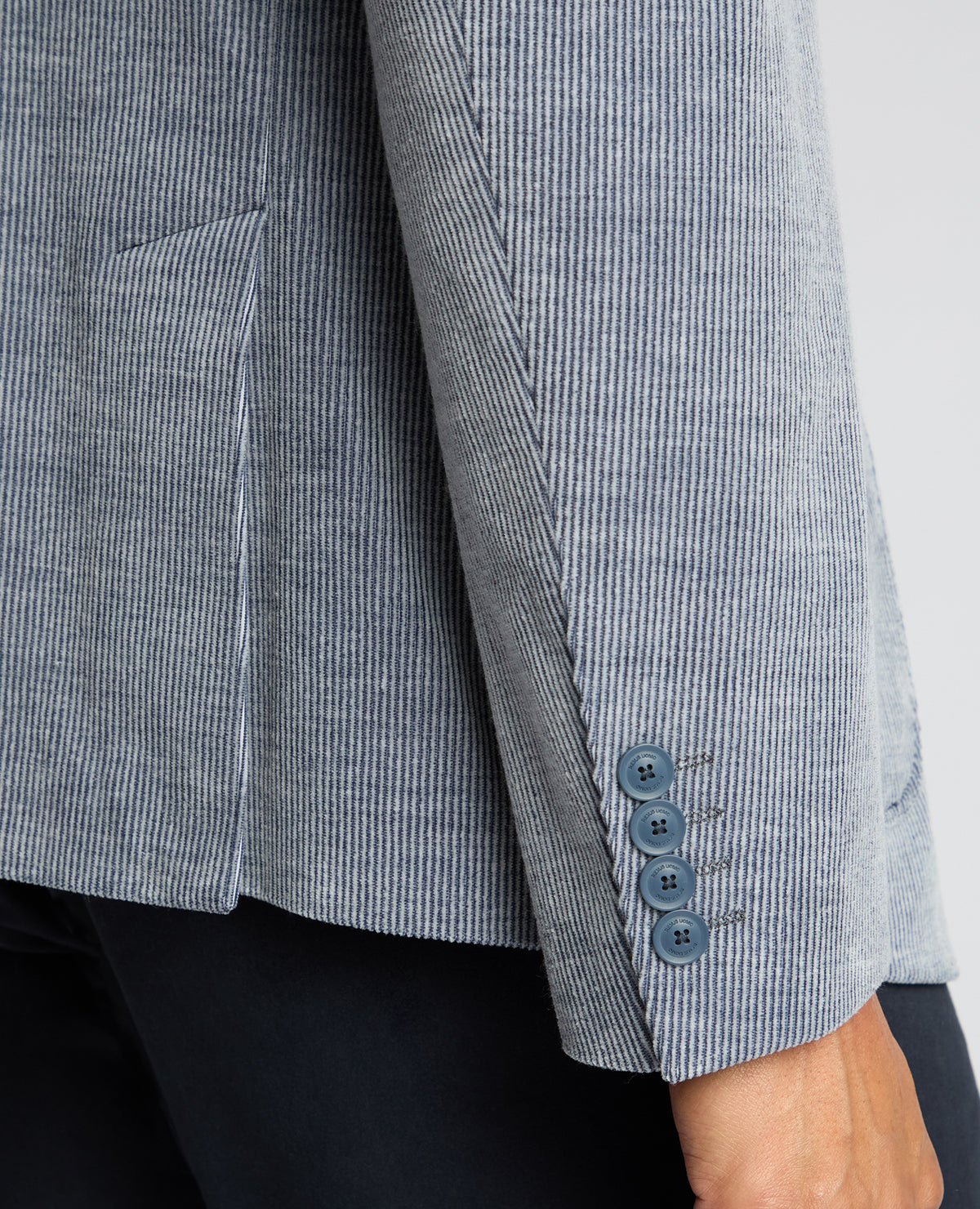 Man wearing a blue Slim Fit Cotton Stretch Alba Jacket
