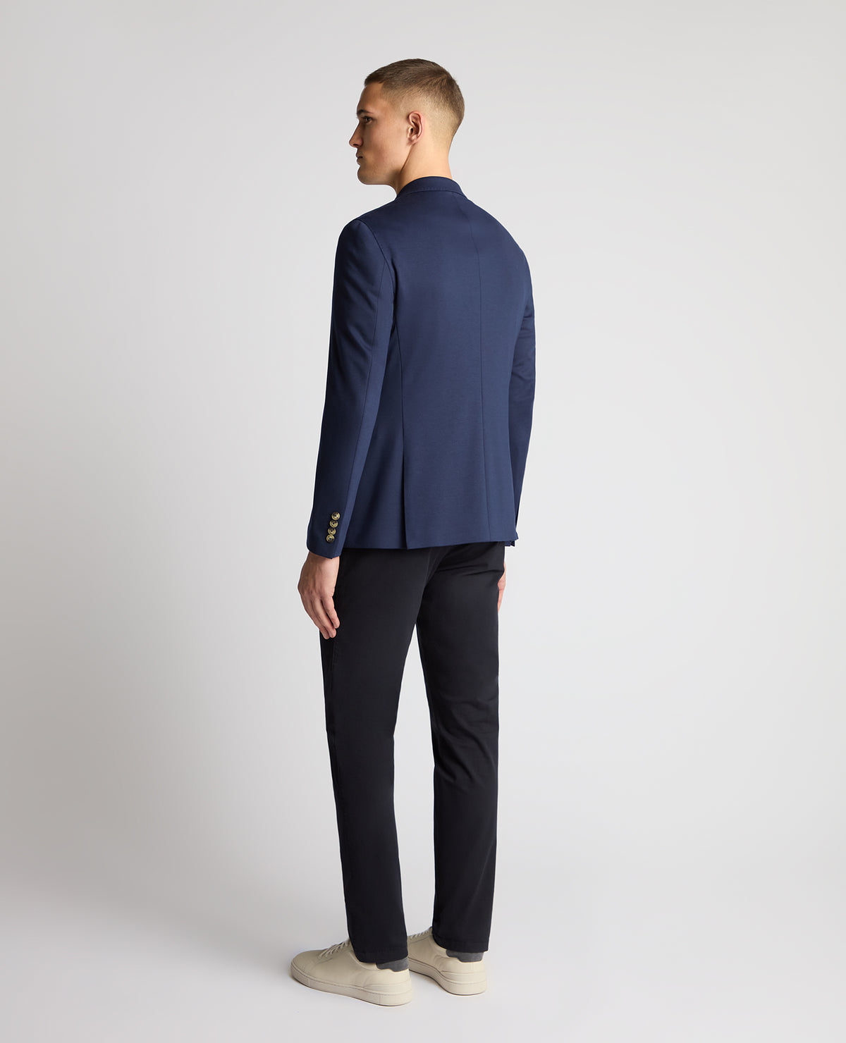 Man wearing a navy jacket