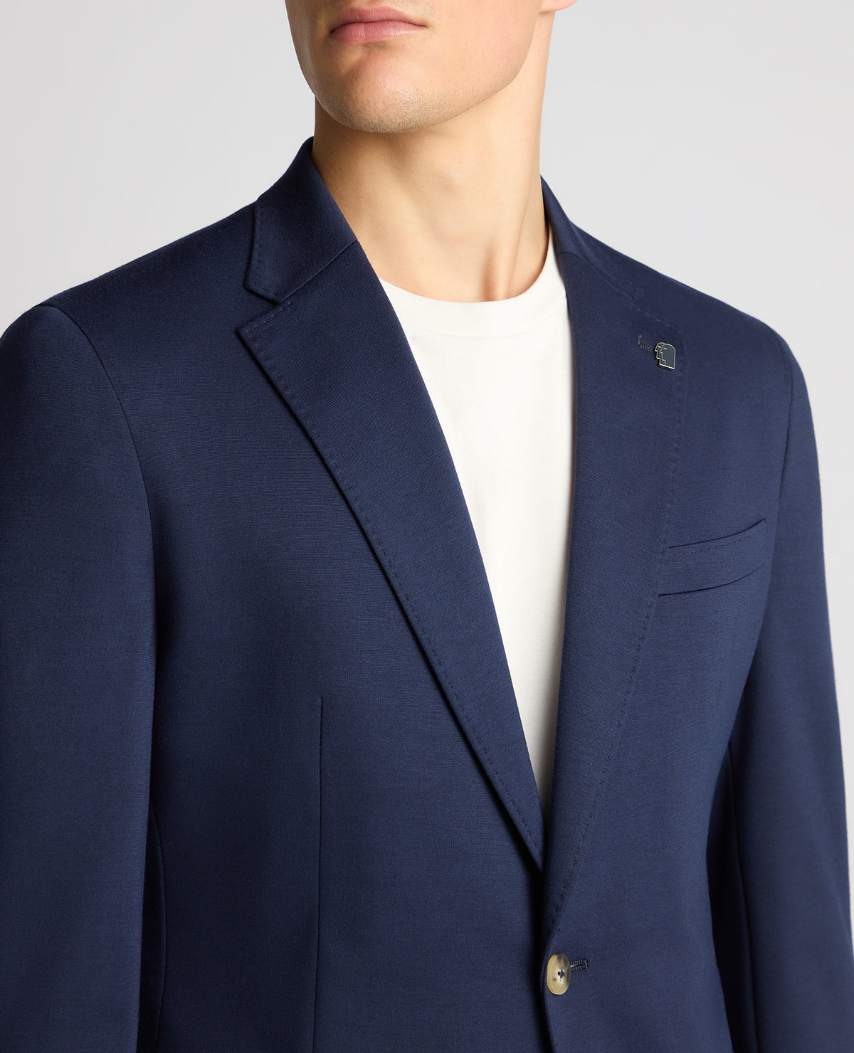 Man wearing a navy jacket