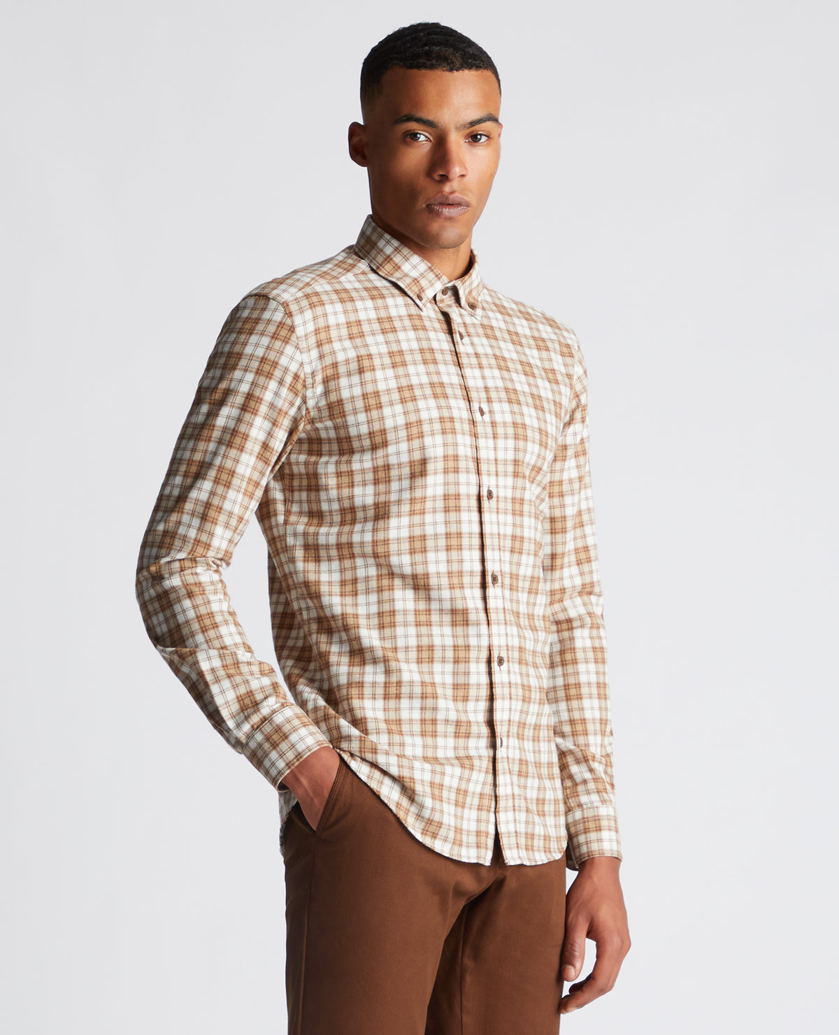 Man wearing a brown Slim Fit Checked Cotton Blend Shirt
