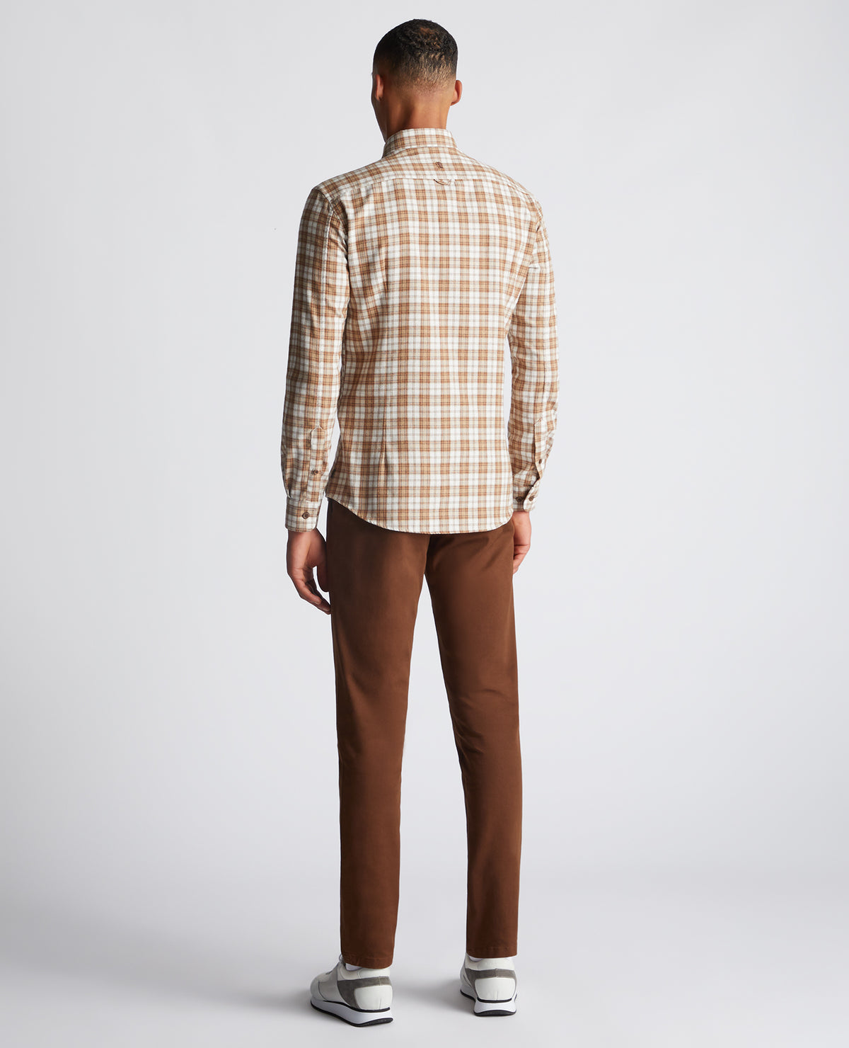 Man wearing a brown Slim Fit Checked Cotton Blend Shirt