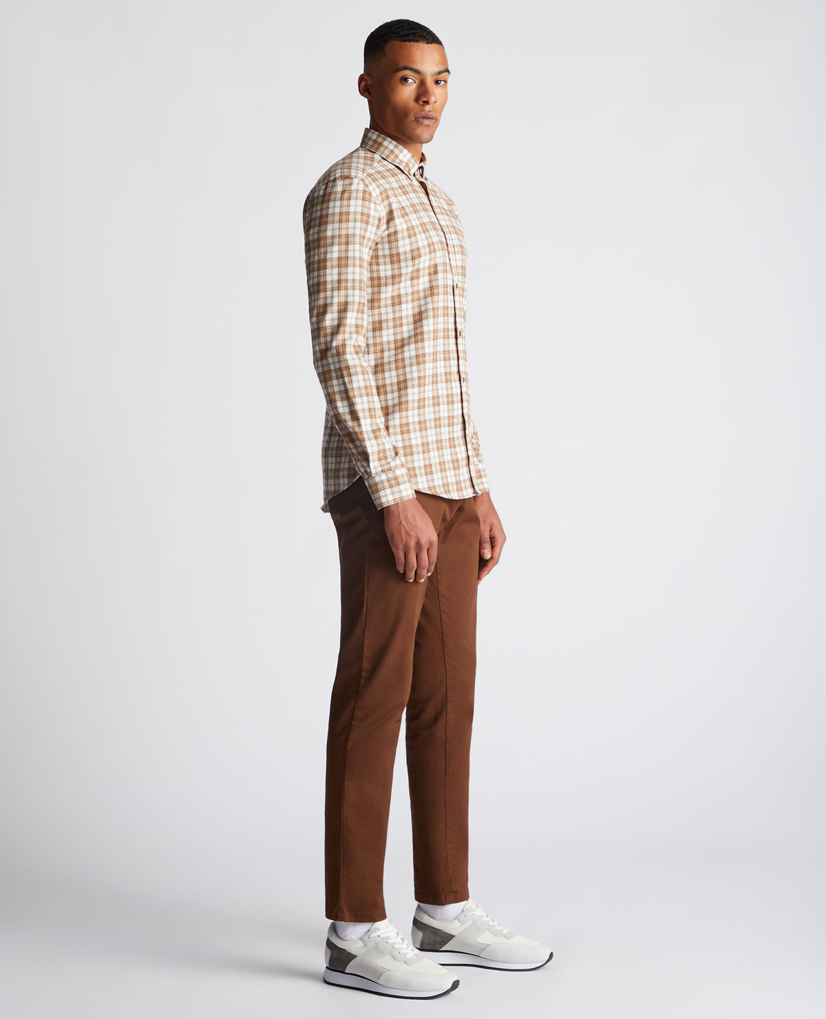 Man wearing a brown Slim Fit Checked Cotton Blend Shirt