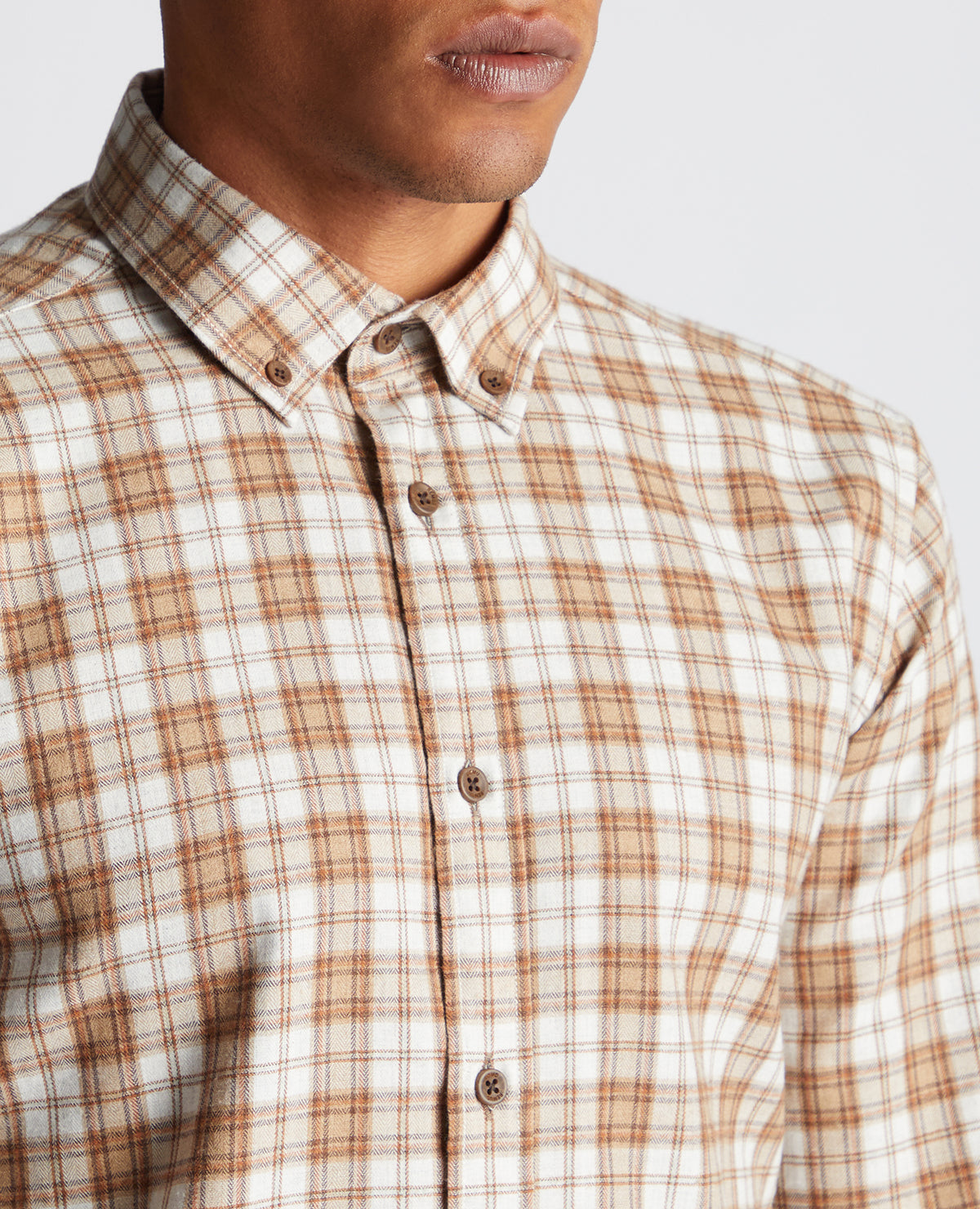 Man wearing a brown Slim Fit Checked Cotton Blend Shirt