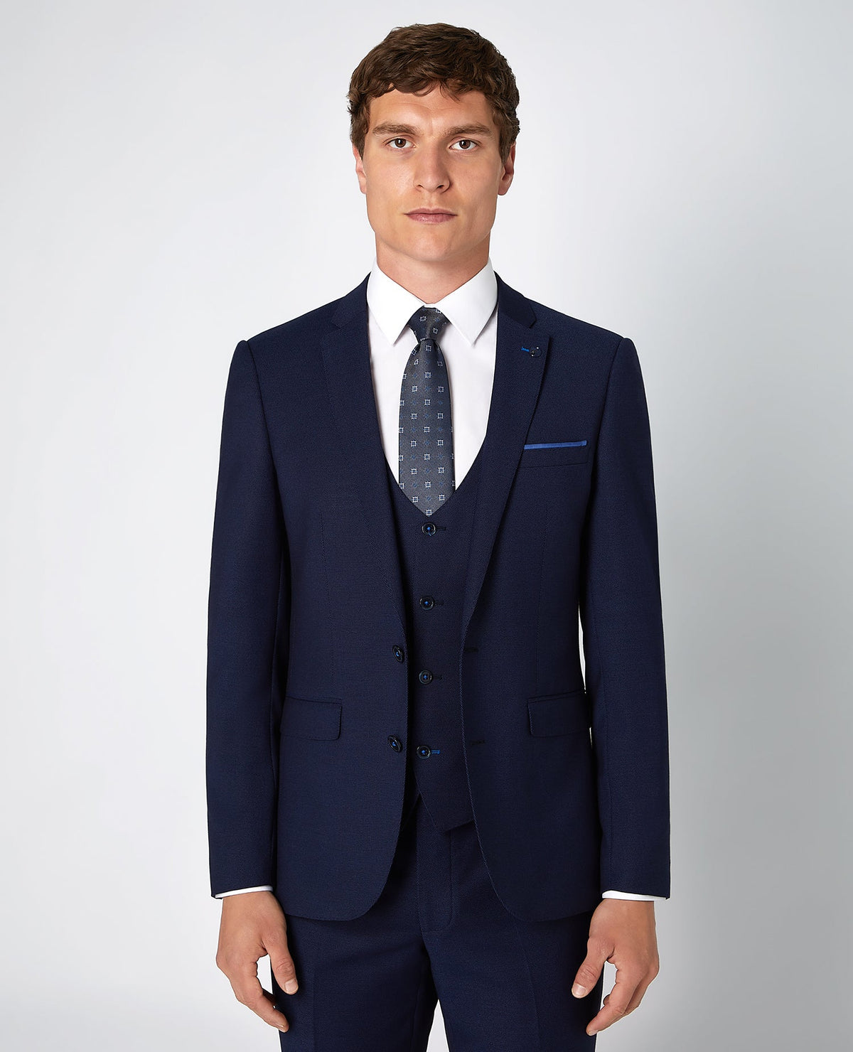 Man wearing a blue X-Slim Fit Stretch 3 Piece Suit